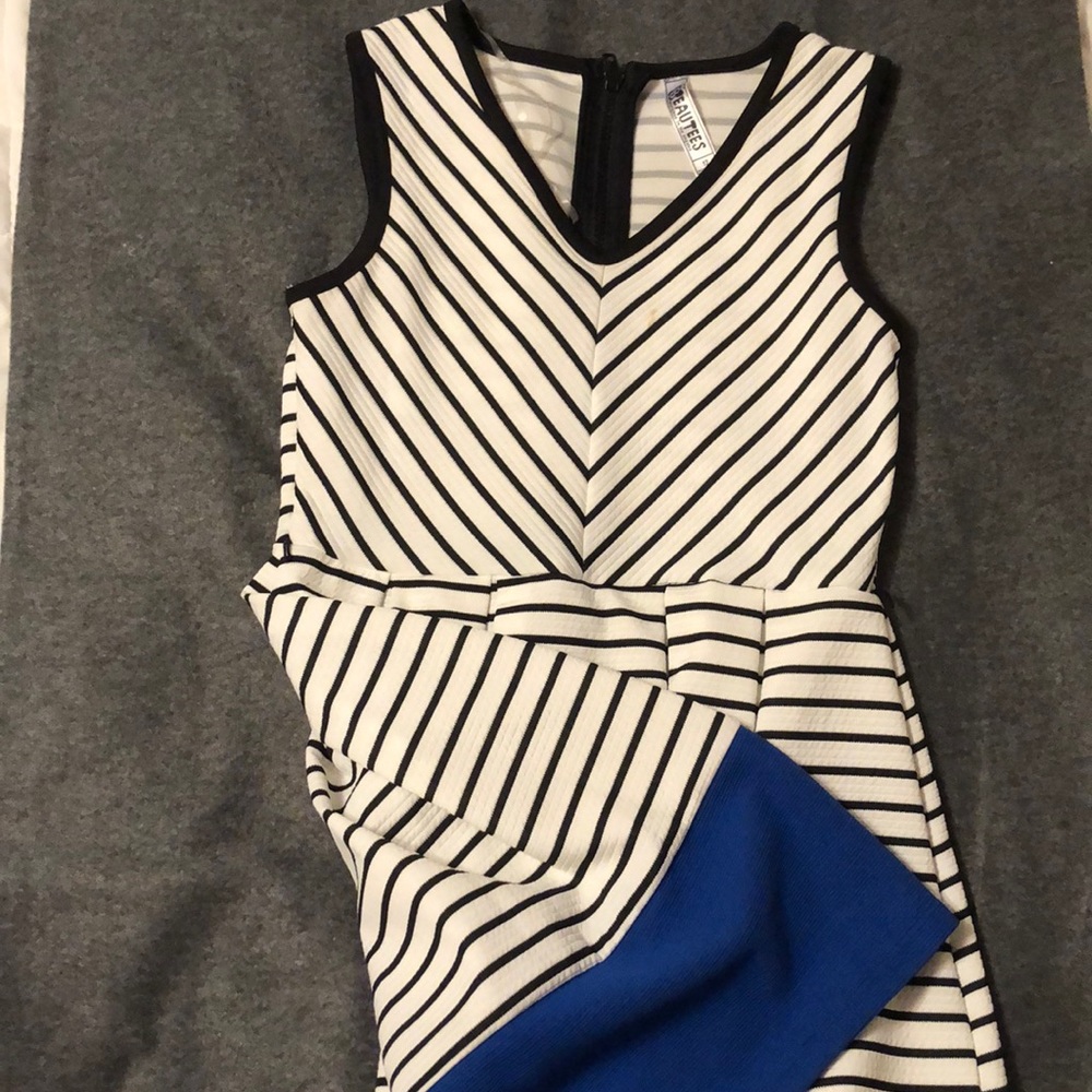 Black, blue, and white dress, w/ v neck.